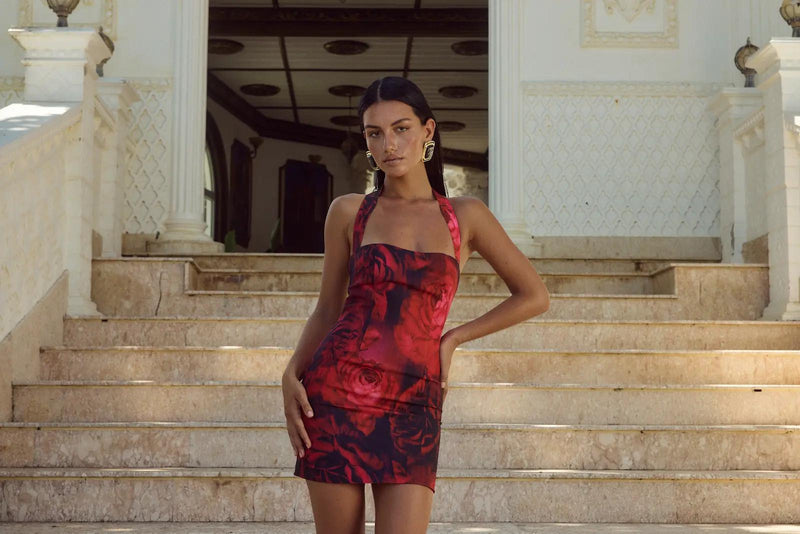 Woman in rose mini dress